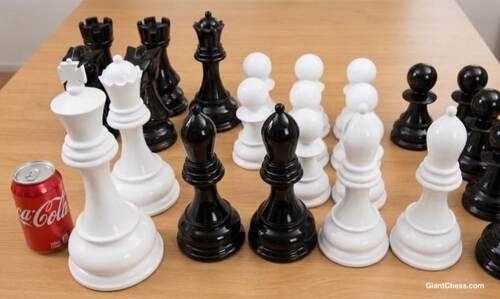 Giant teak chess set photo