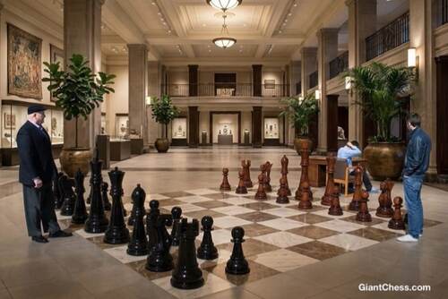 Giant teak chess set photo