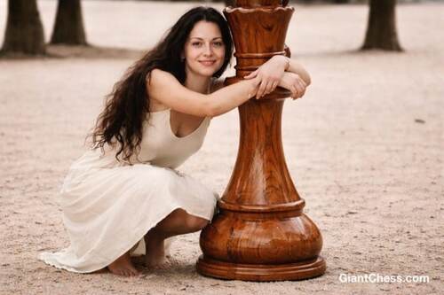 Giant teak chess set photo